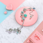 Sterling Silver Blue Surprising Love Dangle Charms With Enamel In White Gold Plated
