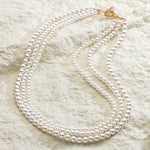Tarnish-resistant Silver Vintage-Inspired Triple Row Pearl Necklace with Gold-Tone T-Bar Clasp - Created With Swarovski® Pearls 4mm-6mm