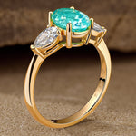 Oval Brilliant Cut Electric Lagoon Hue Lab-Certified Paraiba Tourmaline - Three Stone Classic Engagement Ring 14K Yellow Gold Plated (Includes GRC Certification from Gemstone Research Center)