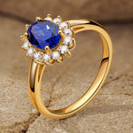 Oval Brilliant Cut Royal Blue Hue Lab-Certified Blue Sapphire - Halo Classic Engagement Ring 14K Yellow Gold Plated (Includes GRC Certification from Gemstone Research Center)