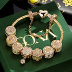 Sterling Silver Memories Of Versailles Charms Bracelet Set In 14K Gold Plated (Includes bracelet and all charms shown)