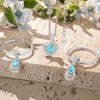 Sterling Silver Ocean's Embrace Charms Necklace and Earrings Set In White Gold Plated