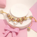 Sterling Silver Melodies of Love Charms Bracelet Set In 14K Gold Plated (Includes bracelet and all charms shown)